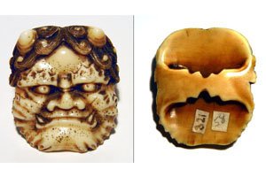 Netsukes mit Dämonen Gesicht Maske.